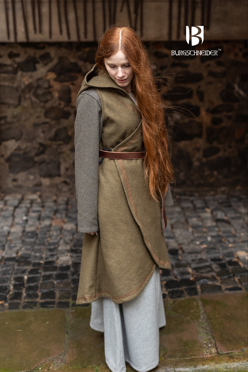 Woman wearing the Burgschneider Myrana autumn green wrap dress, available at The Clothier&rsquo;s House at the Georgia Renaissance Festival.